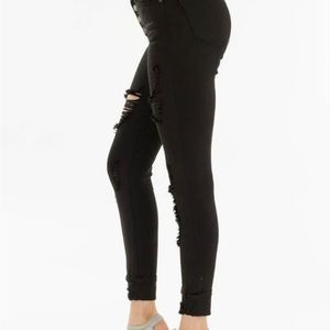 High rise black distressed Bebe skinny jeans